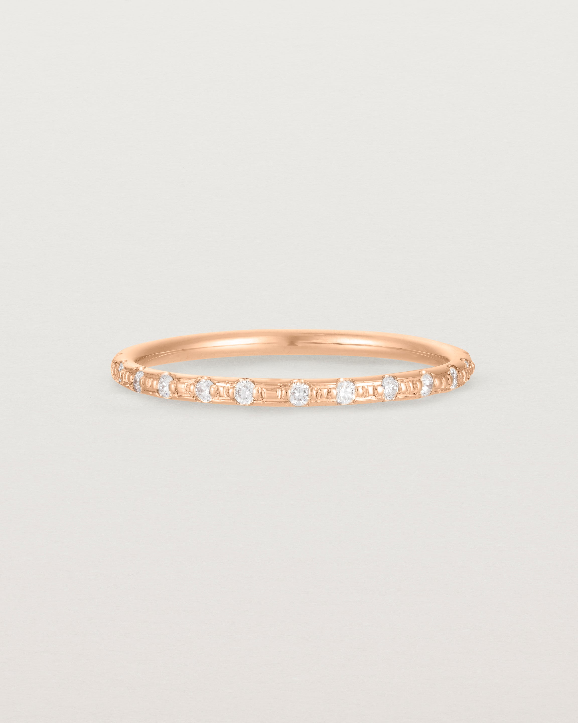 Front View of Cascade Round Profile Wedding Ring | Diamonds | Rose Gold