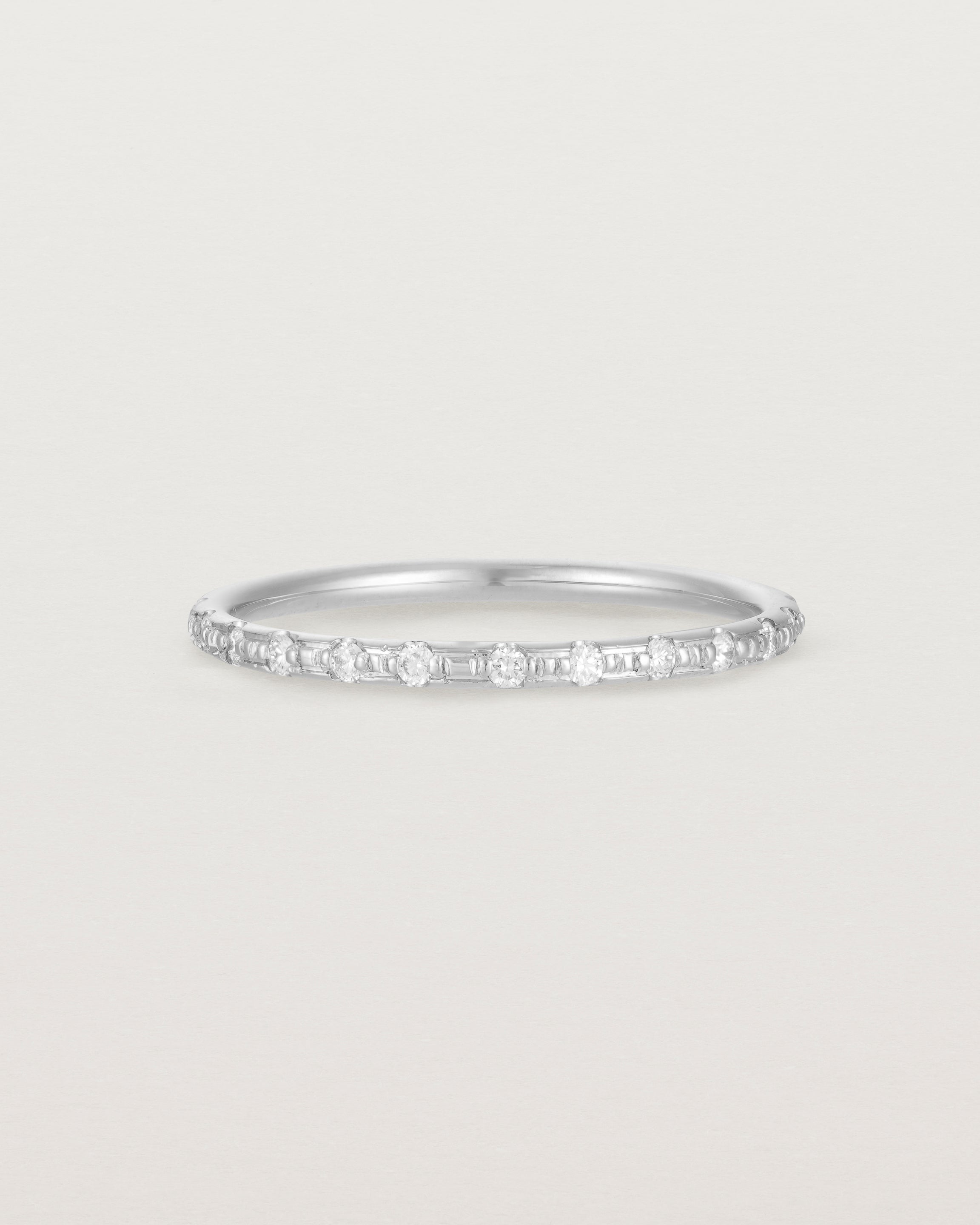 Front View of Cascade Round Profile Wedding Ring | Diamonds | White Gold