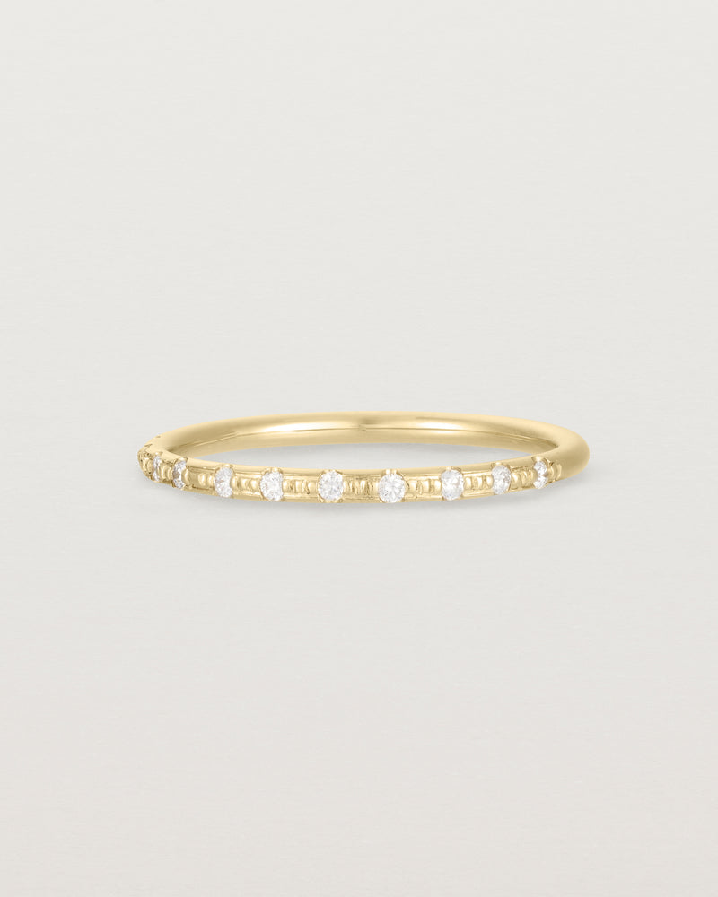 Angled View of Cascade Round Profile Wedding Ring | Diamonds | Yellow Gold