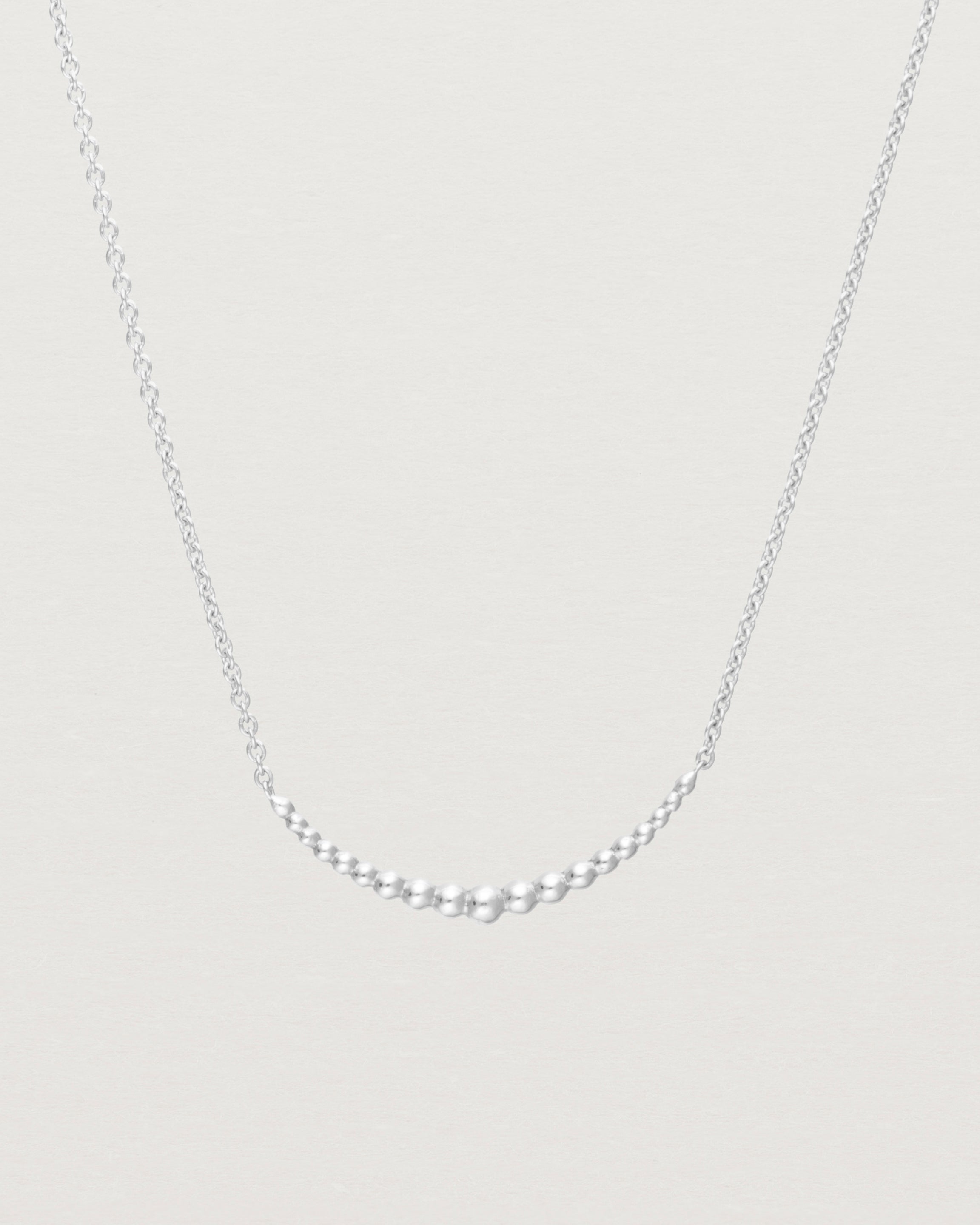 Close up of the Crescent Necklace in Sterling Silver.