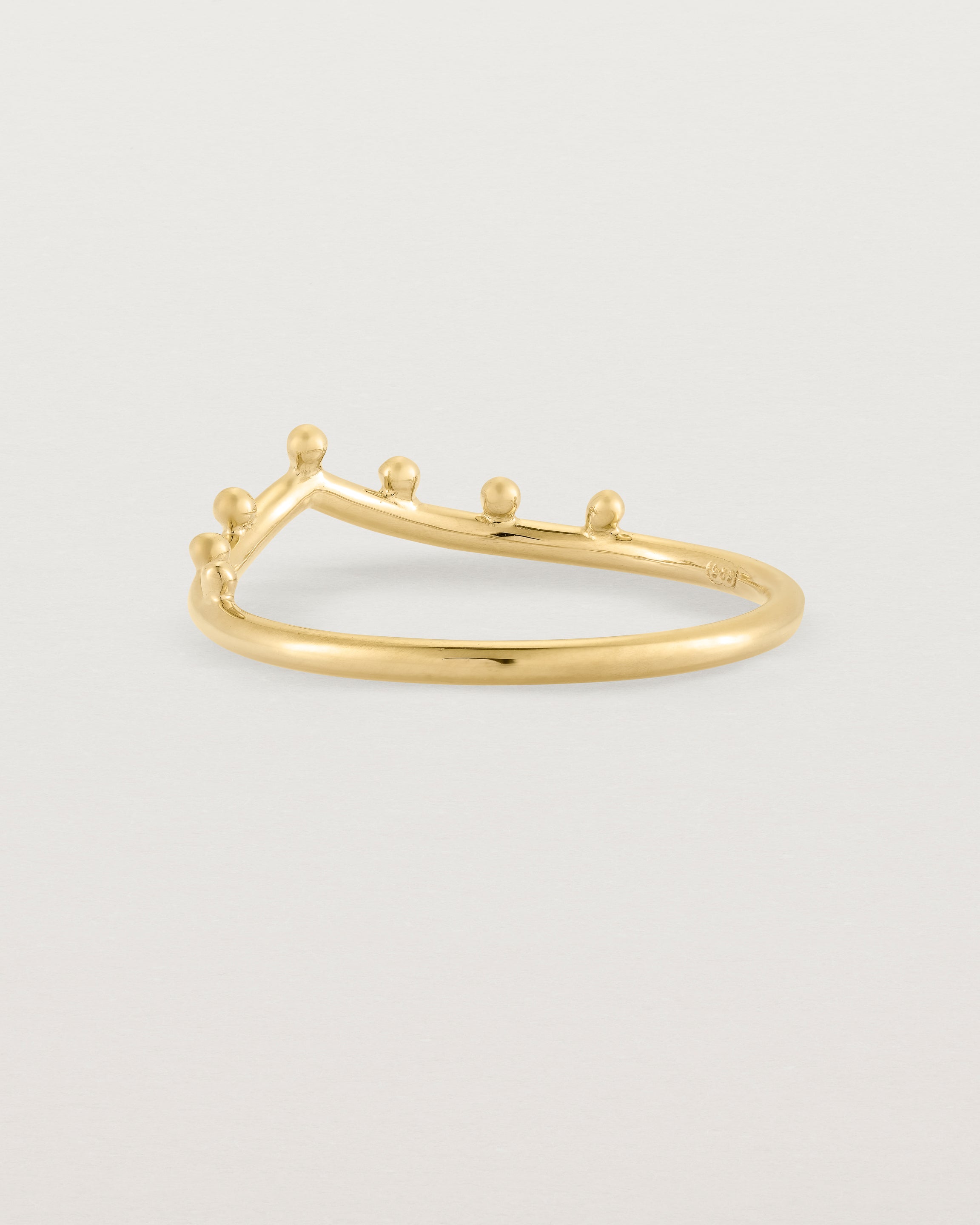 Angled view of the Dotted Gentle Point Ring in Yellow Gold.