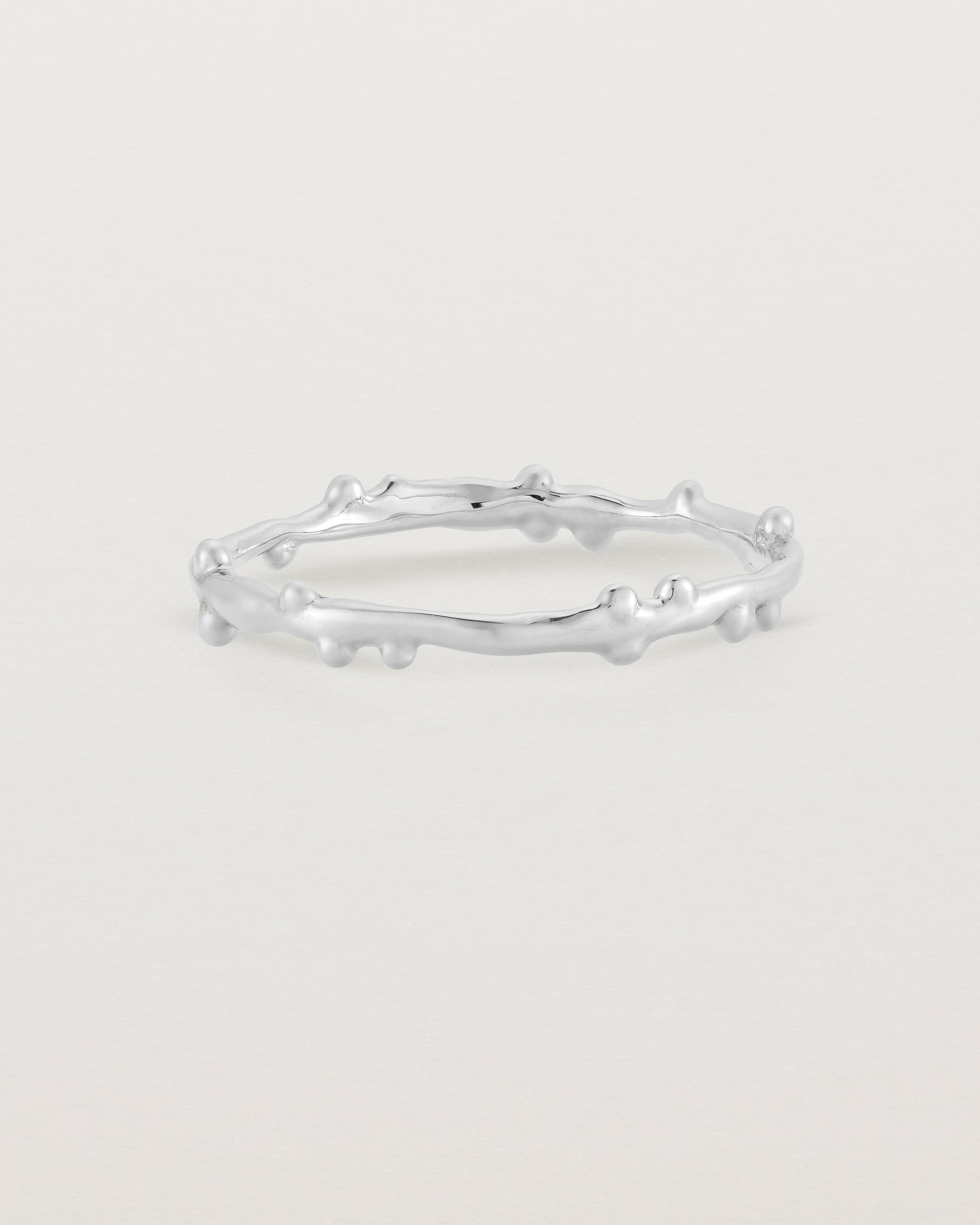 The Dotted Organic Stacking Ring in Sterling Silver.