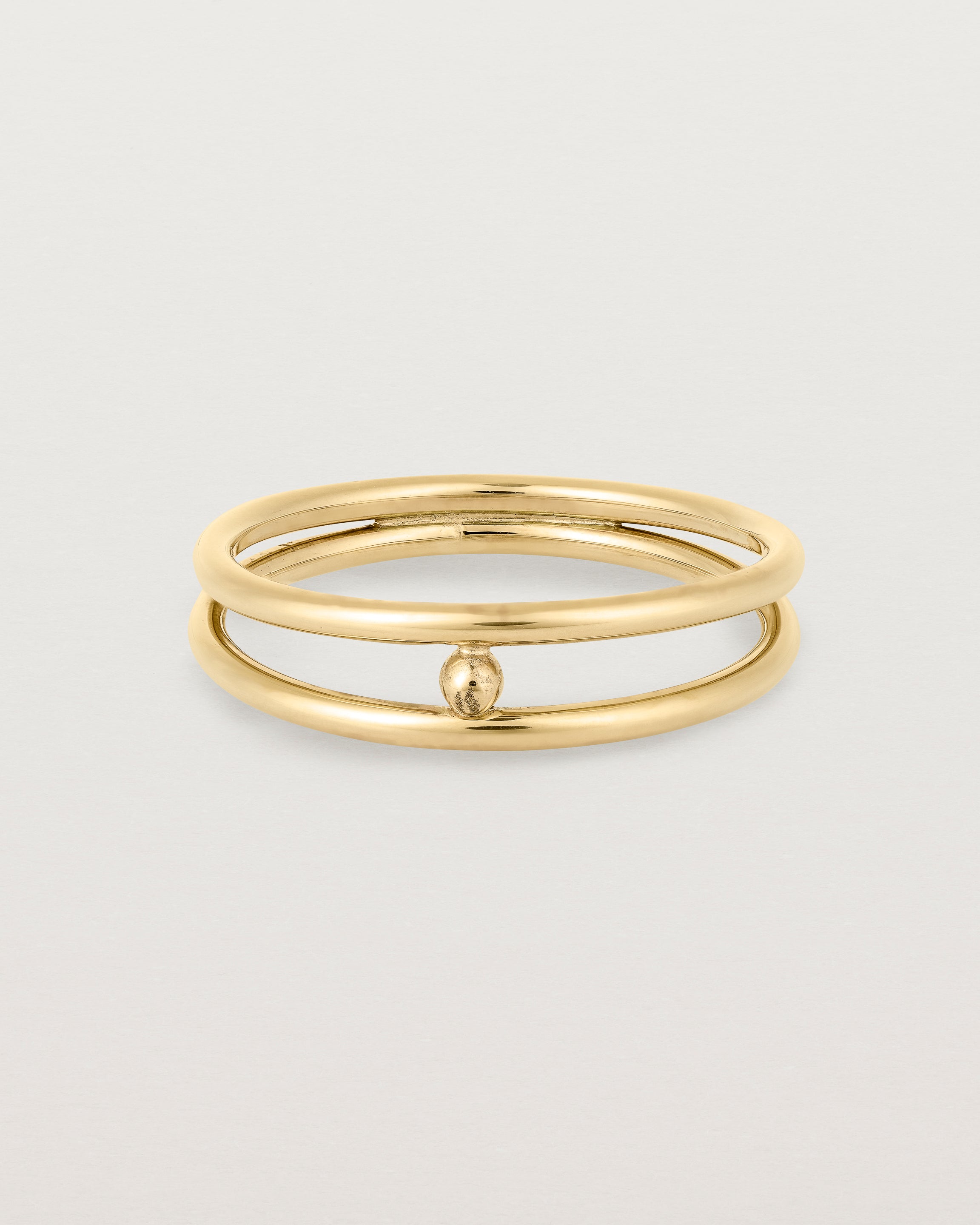 Front view of the Double Reliquum Ring in Yellow Gold.