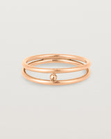 Front view of the Double Reliquum Ring in Rose Gold.