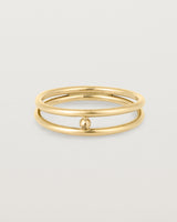 Front view of the Double Reliquum Ring in Yellow Gold.