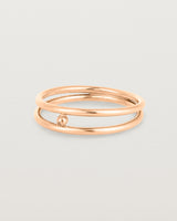Angled view of the Double Reliquum Ring in Rose Gold.