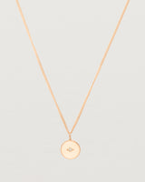 Close up of the Eily Necklace with a diamond in rose gold.