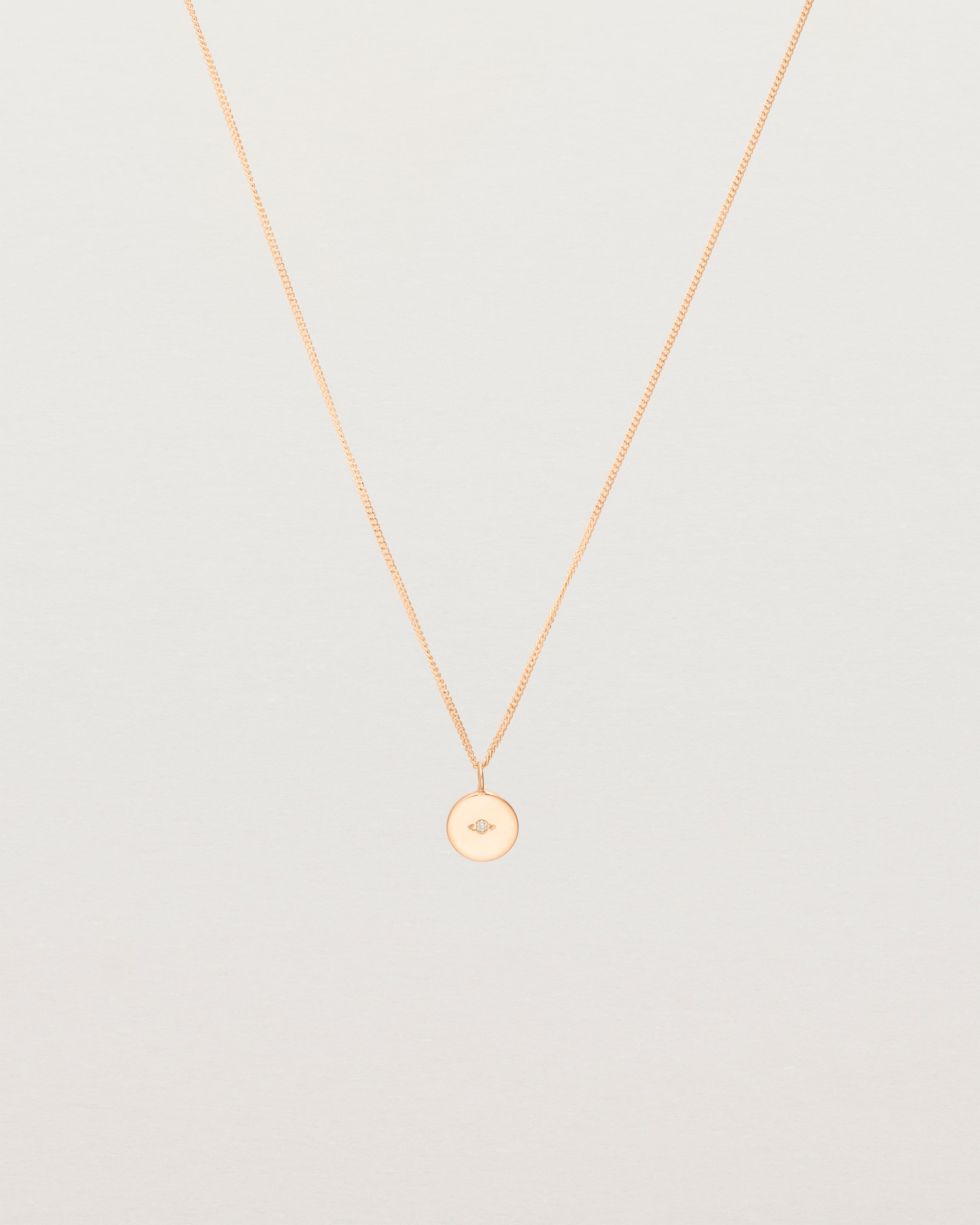 Front view of the Eily Necklace with a diamond in rose gold.