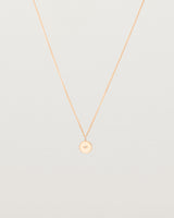 Front view of the Eily Necklace with a diamond in rose gold.
