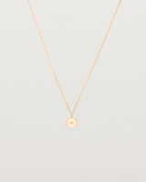 Front view of the Eily Necklace with a diamond in rose gold.