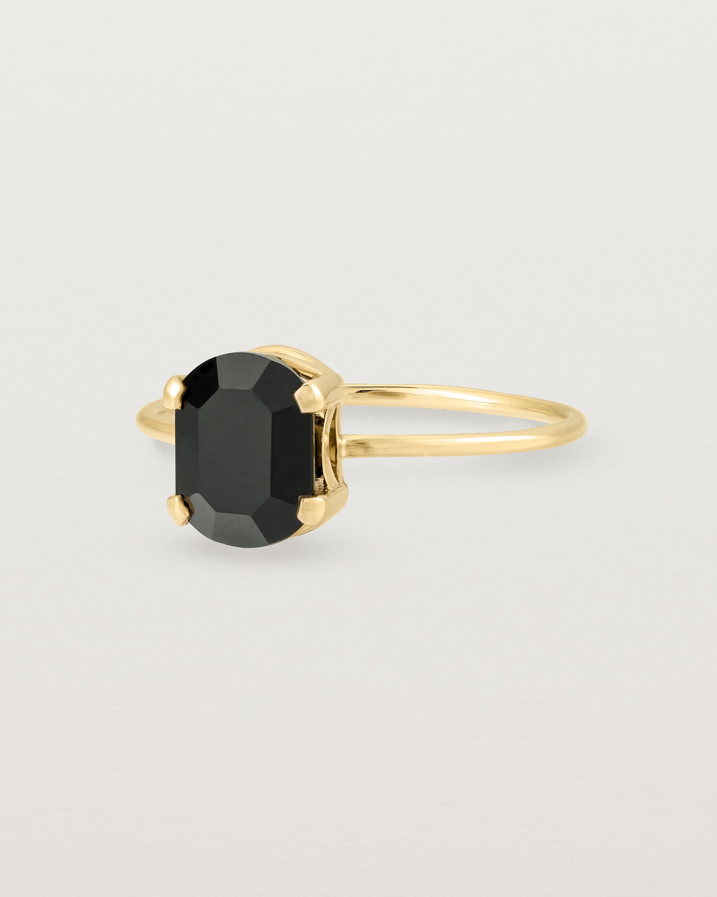 Front view of the Fei Ring | Black Spinel in Yellow Gold.