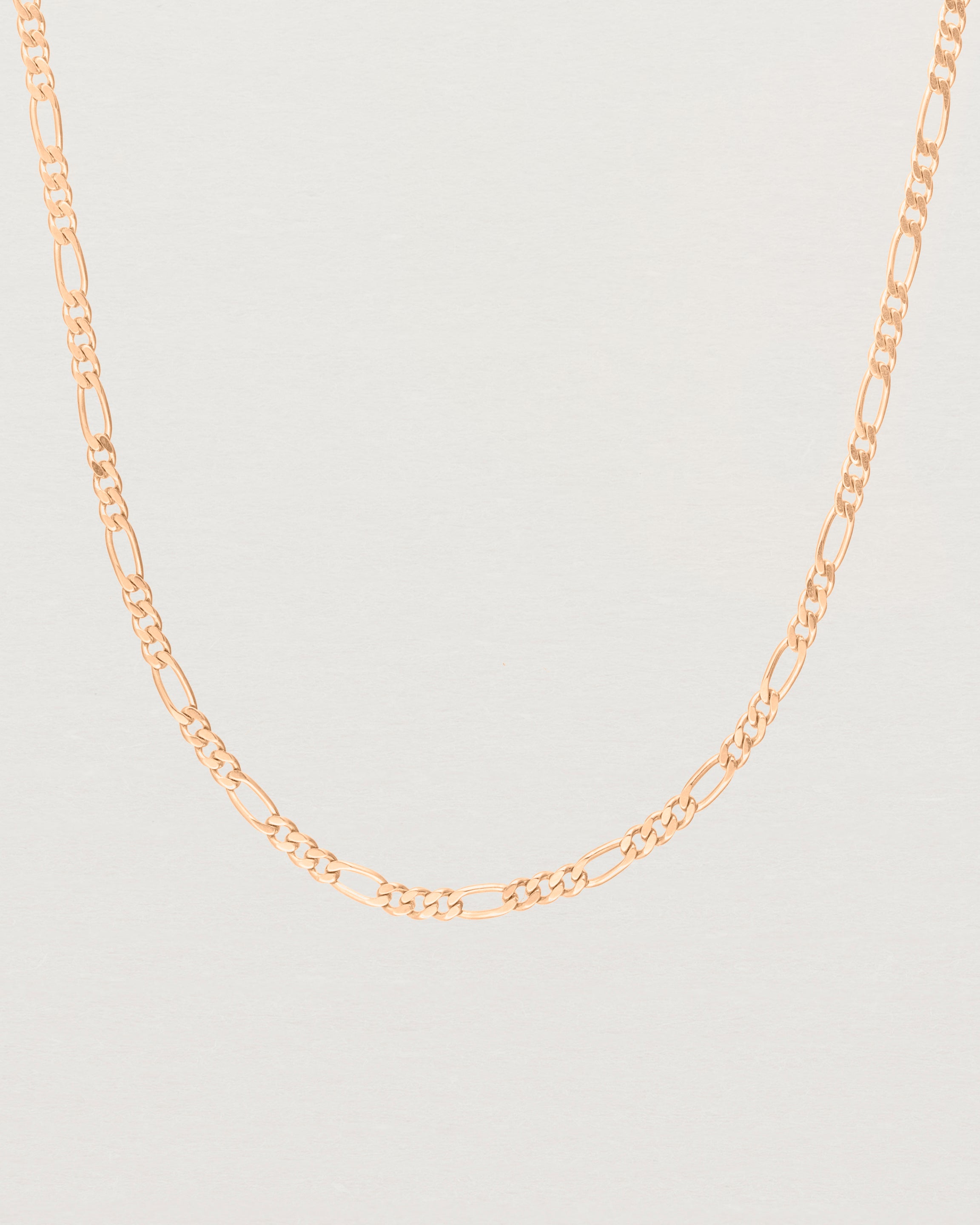Close up of the Figaro Chain Necklace | Bold in Rose Gold.