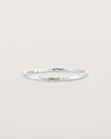 Front view of the Faceted Wedding Ring in White Gold.