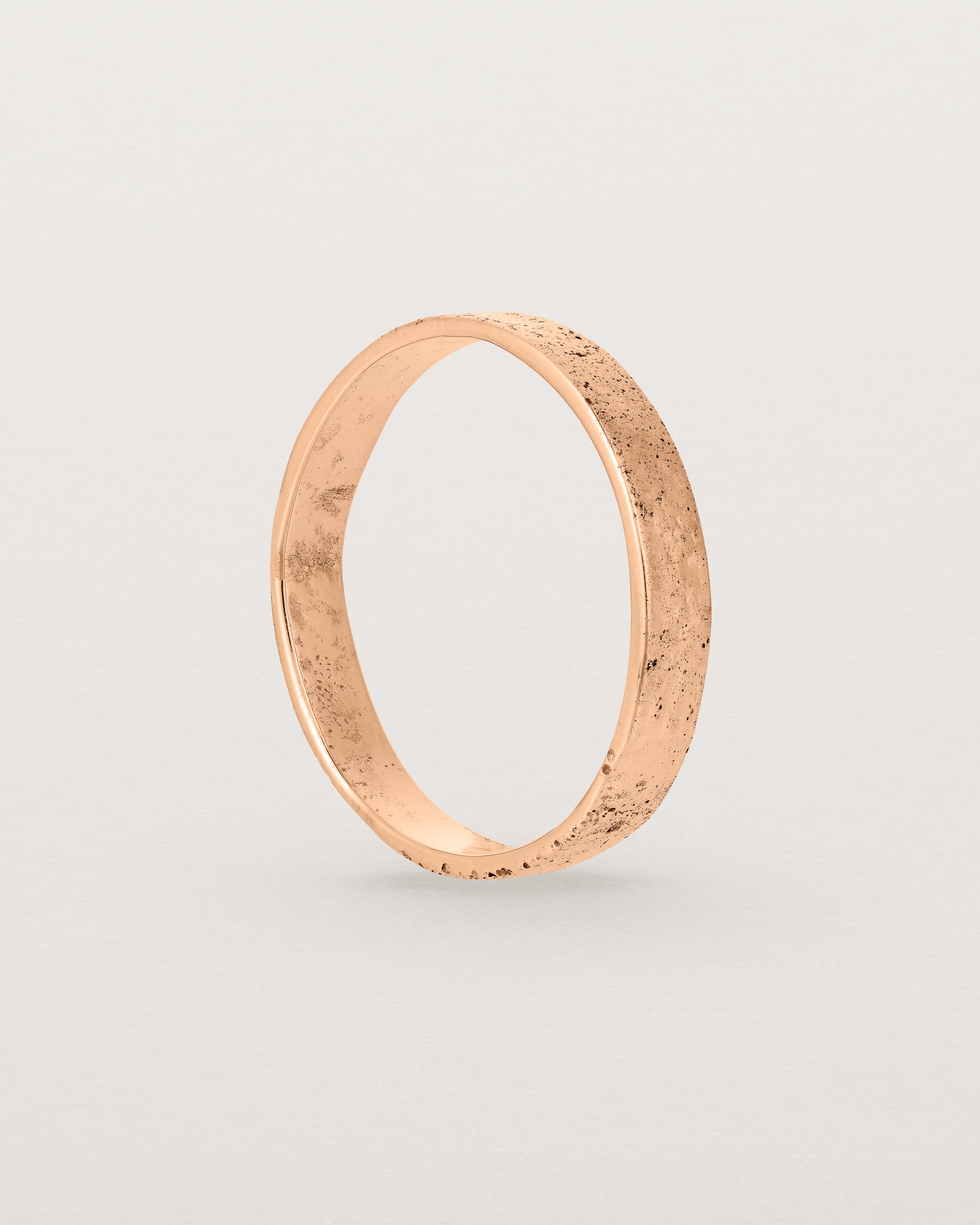 Standing view of the Naum Stacking Ring in Rose Gold.