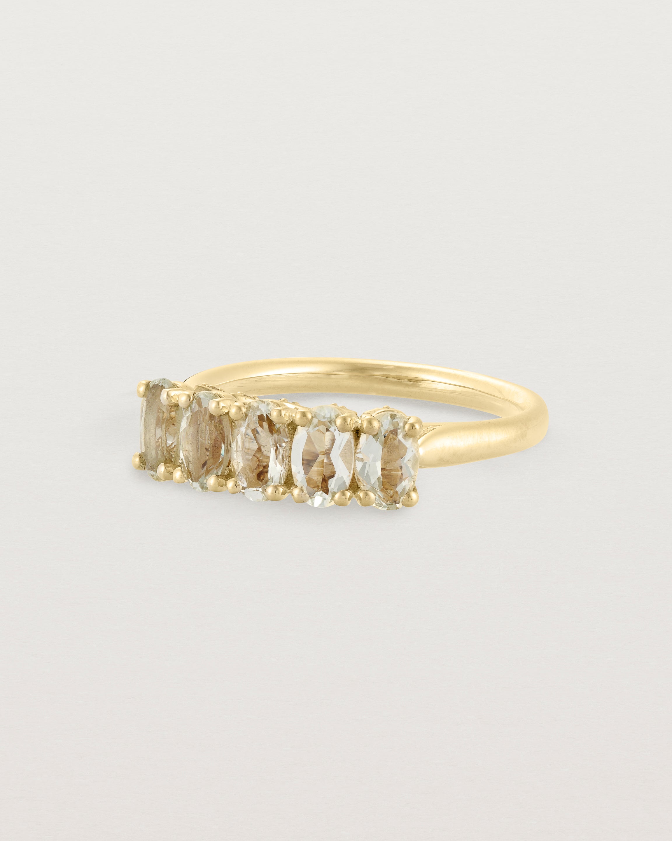 angled view of the Fiore Wrap Ring | Green Amethyst | Yellow Gold.