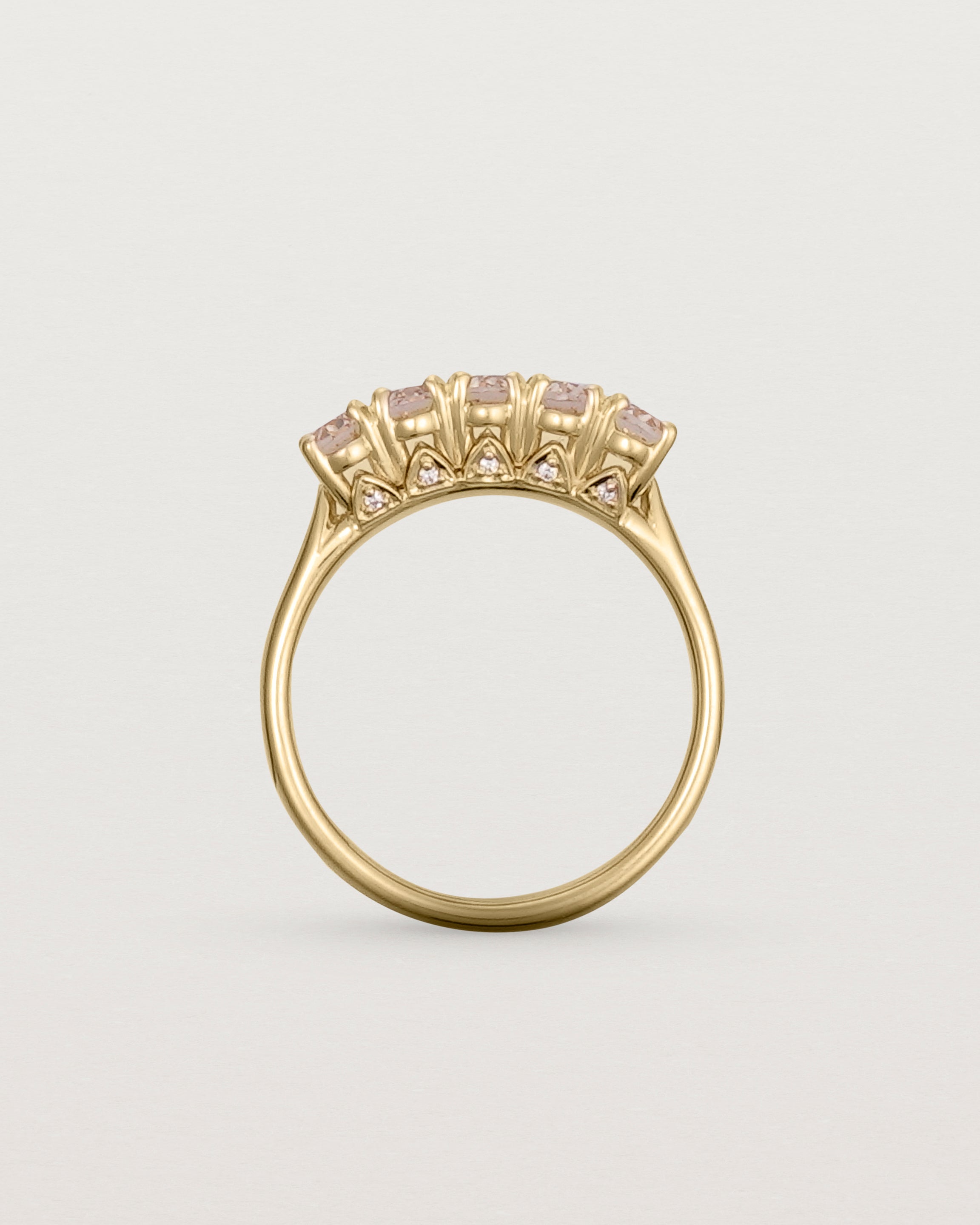 Standing view of the Fiore Wrap Ring | Savannah Sunstone | Yellow Gold.