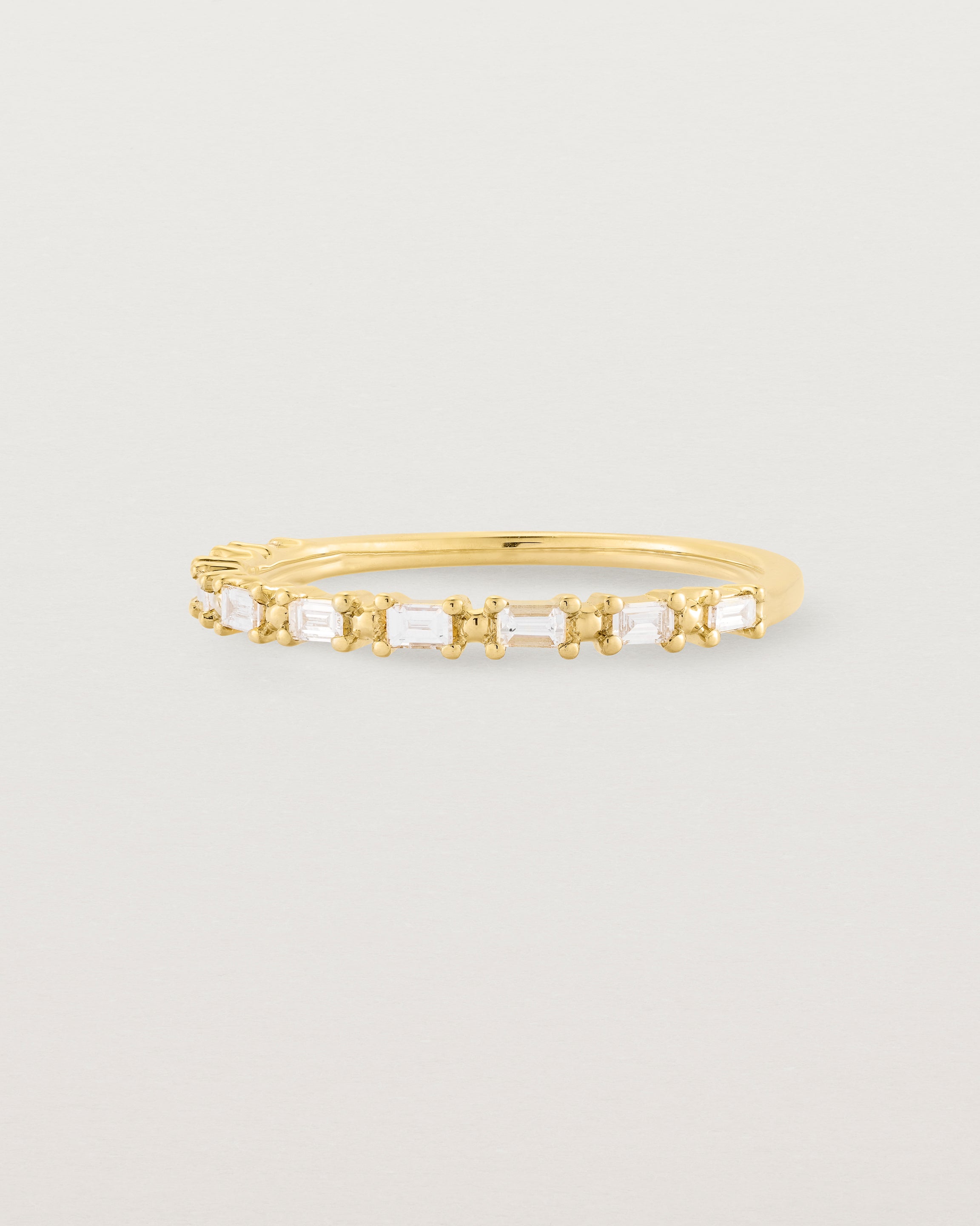 Angled view of the Demi Khyati Ring | Diamonds in Yellow Gold.