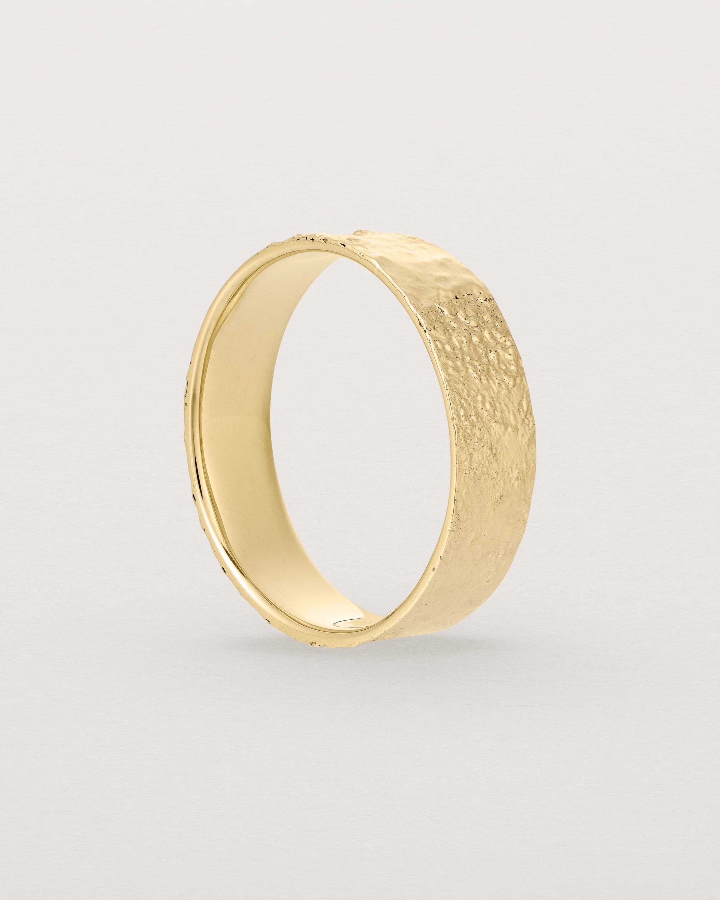 The Naum Stacking Ring | Heavy in Yellow Gold standing.