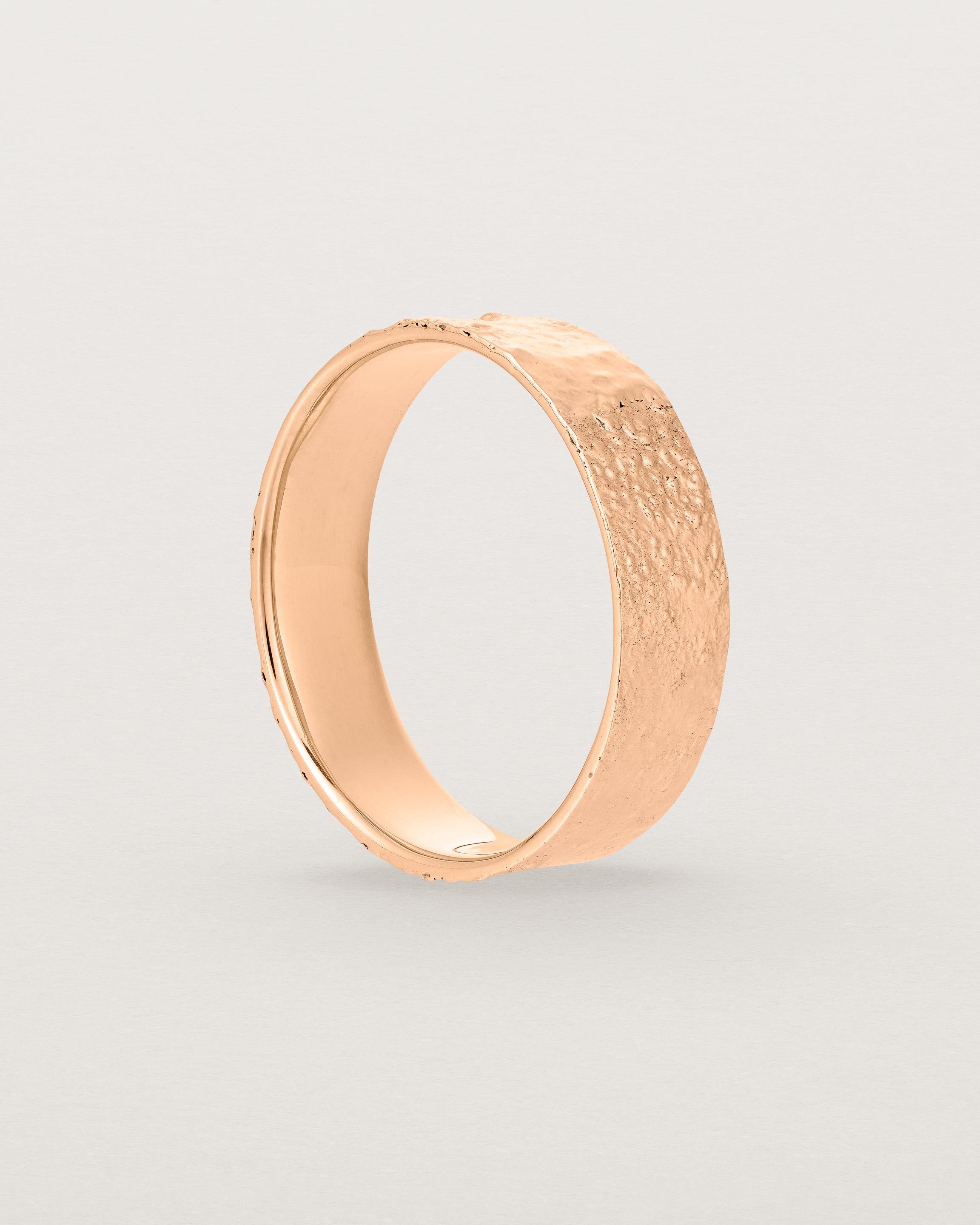The Naum Stacking Ring | Heavy in Rose Gold standing.