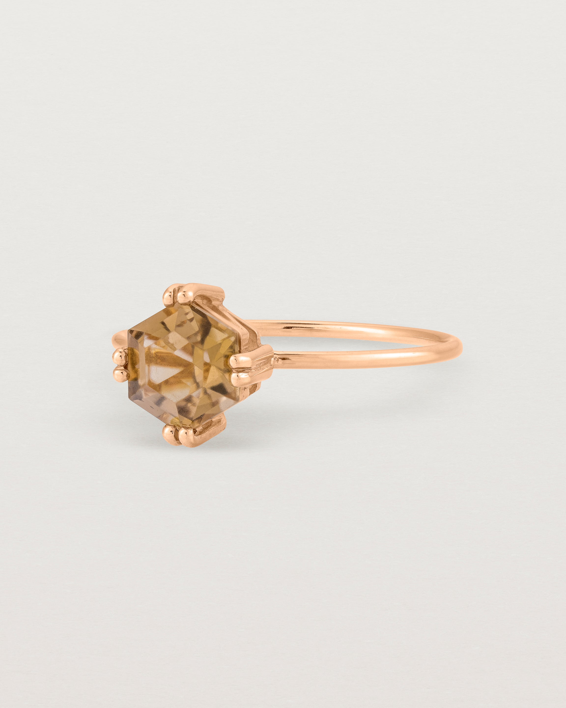 Angled view of the Hexagon Ring | Smokey Quartz in Rose Gold.