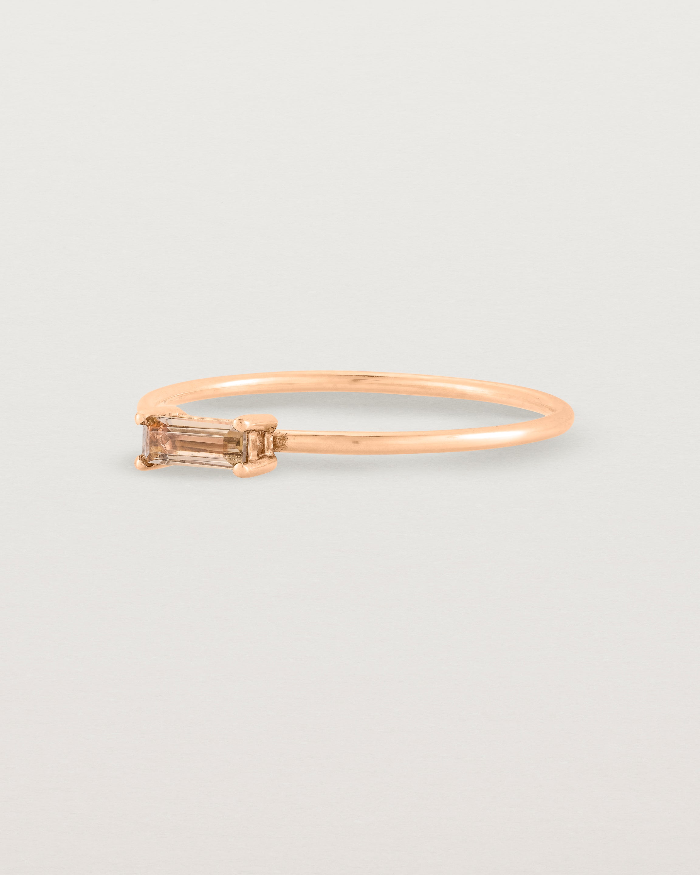 Angled view of the Horizontal Baguette Ring | Smokey Quartz in Rose Gold.