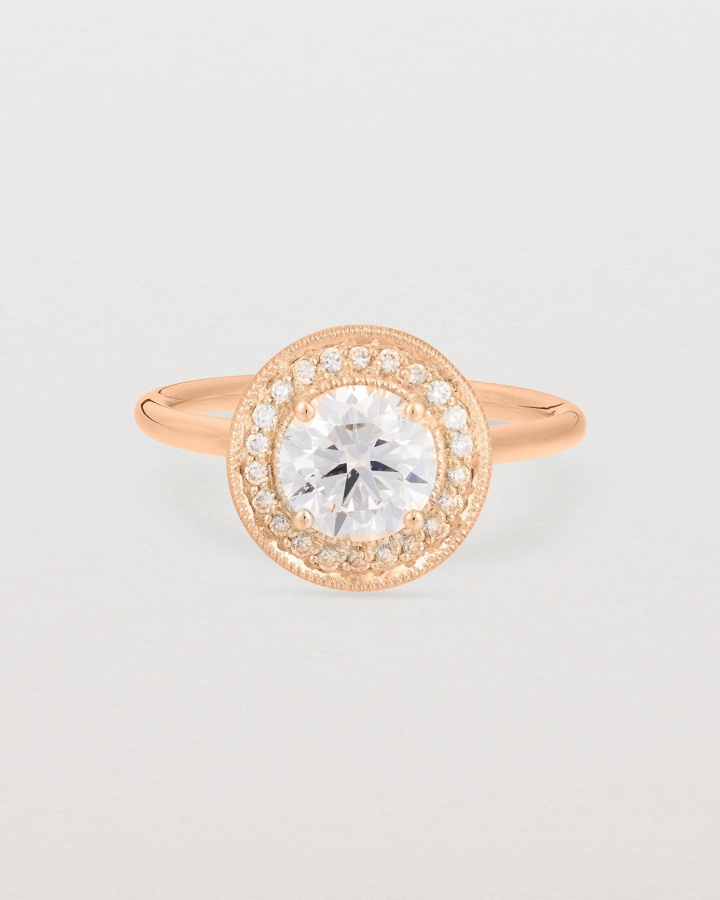 Front view of the Imogen Halo Ring | Laboratory Grown Diamonds in Rose Gold.