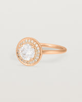 Angled view of the Imogen Halo Ring | Laboratory Grown Diamonds in Rose Gold.