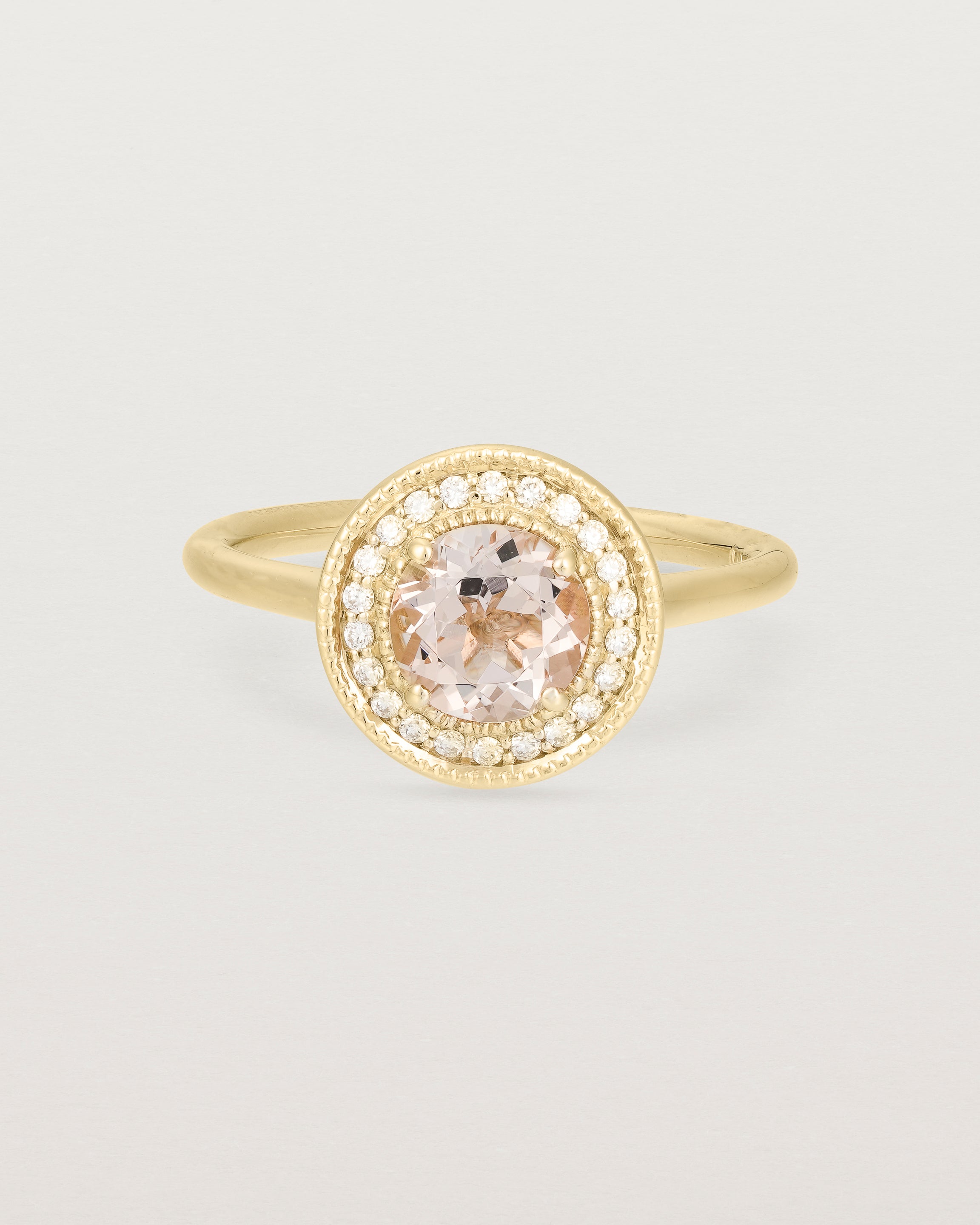 Front view of the Imogen Halo Ring | Morganite & Diamonds in Yellow Gold.
