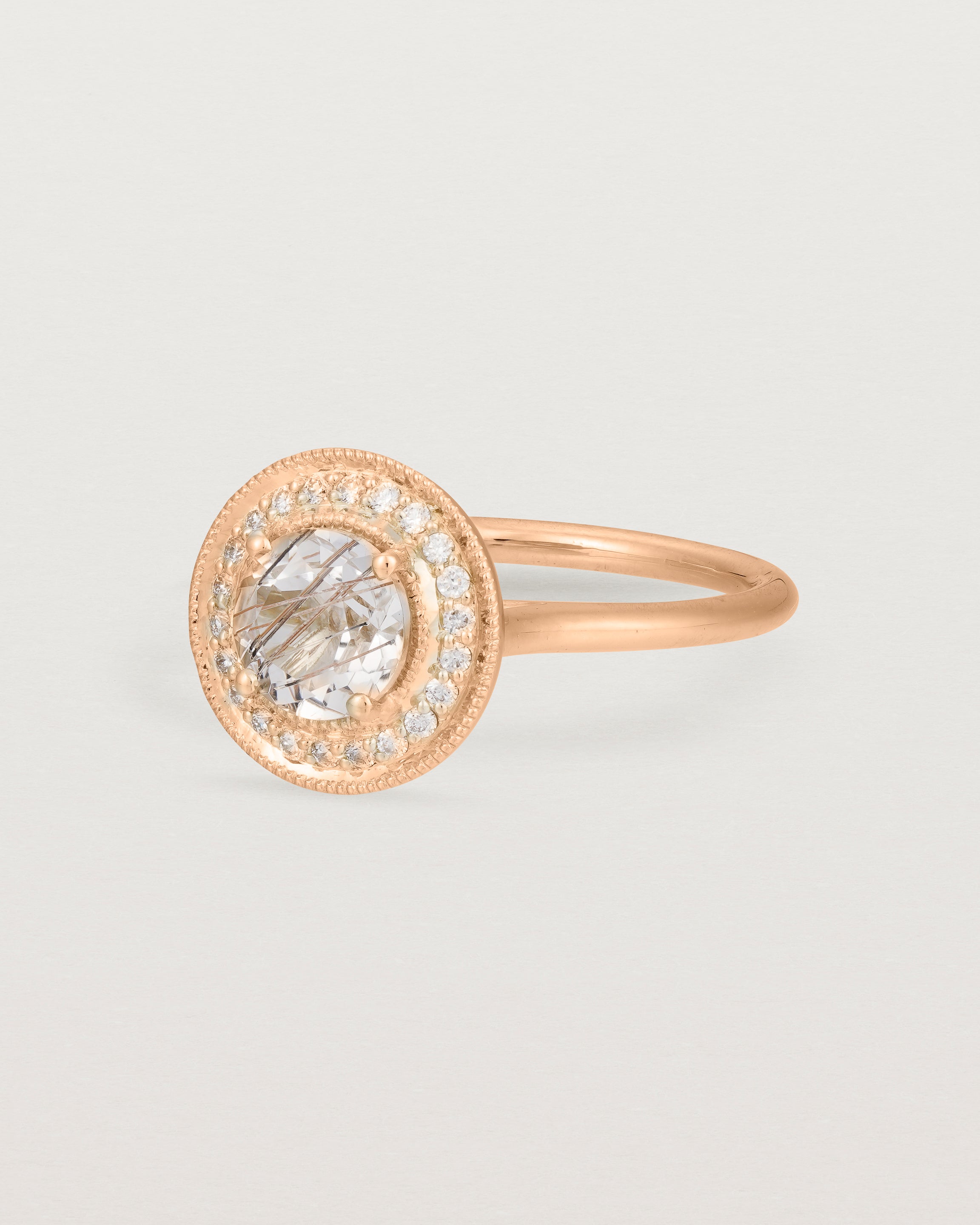 Angled view of the Imogen Halo Ring | Rutilated Quartz & Diamonds in Rose Gold.