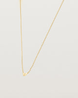 Angled view of the Jia Necklace in Yellow Gold.