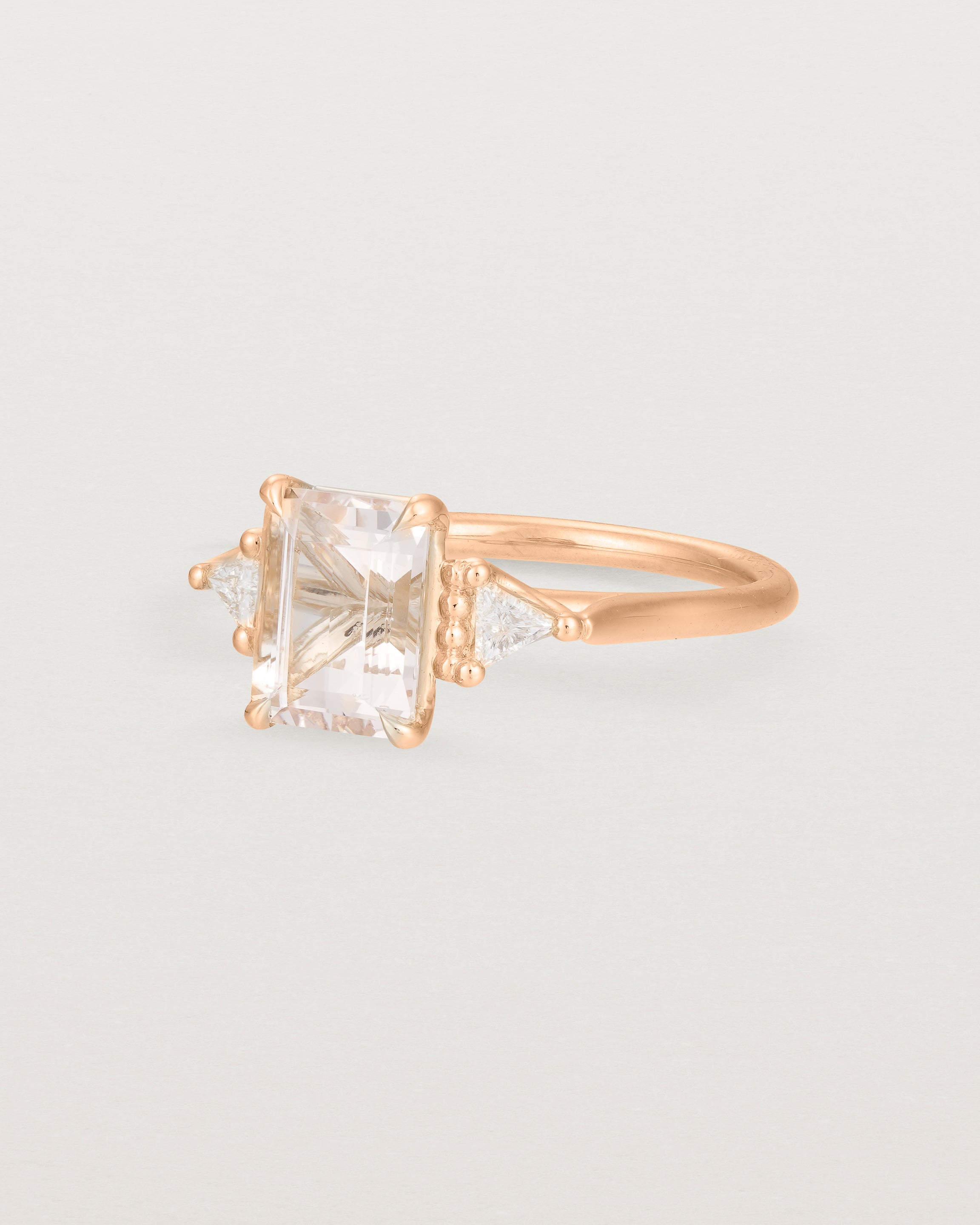 Angled view of the Lille Ring | Morganite & Diamonds in Rose Gold.