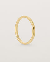 Standing view of the Millgrain Wedding Ring | 2mm in Yellow Gold.