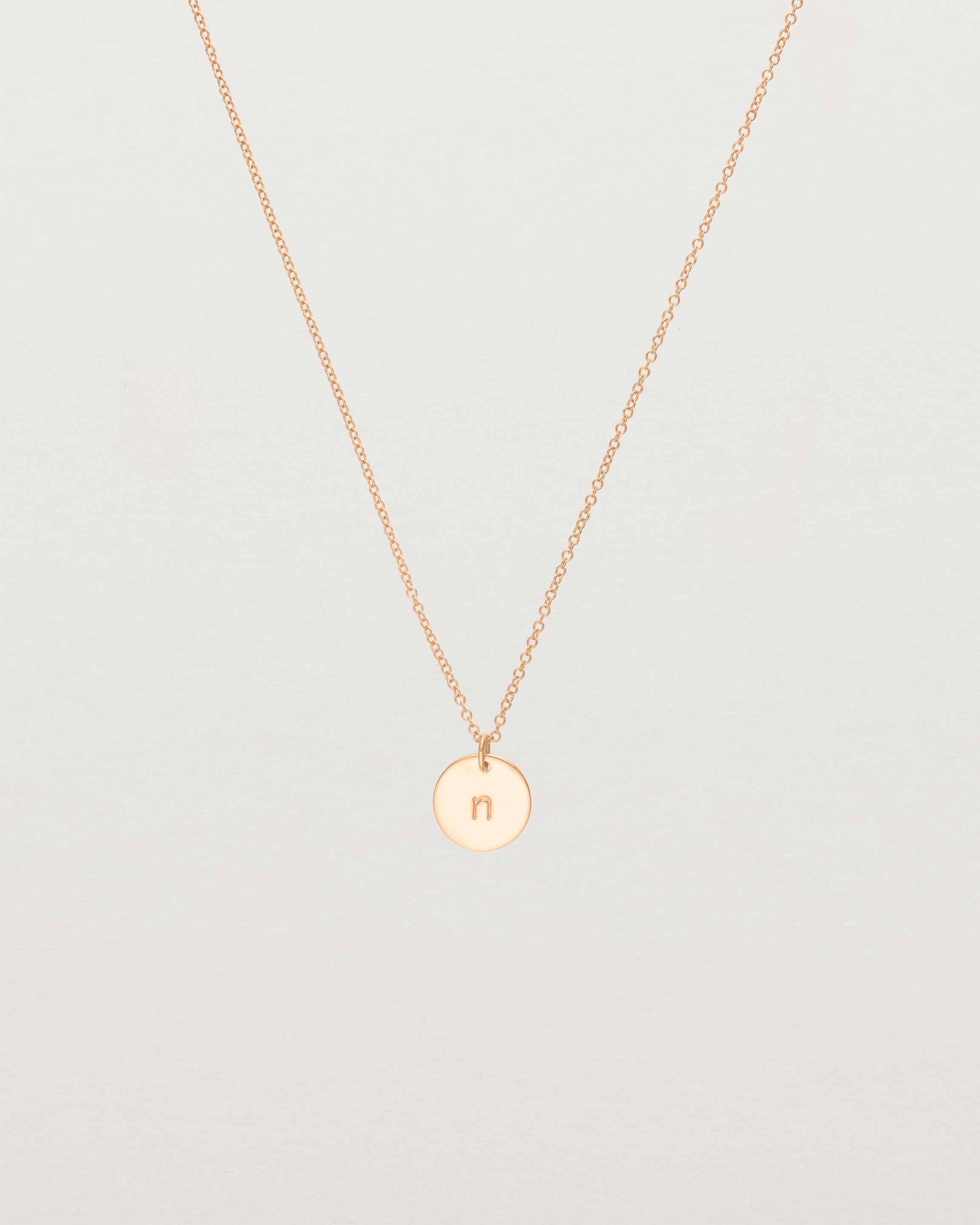 Front view of the Mini Initial Necklace in Rose Gold.