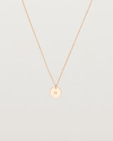 Front view of the Mini Initial Necklace in Rose Gold.