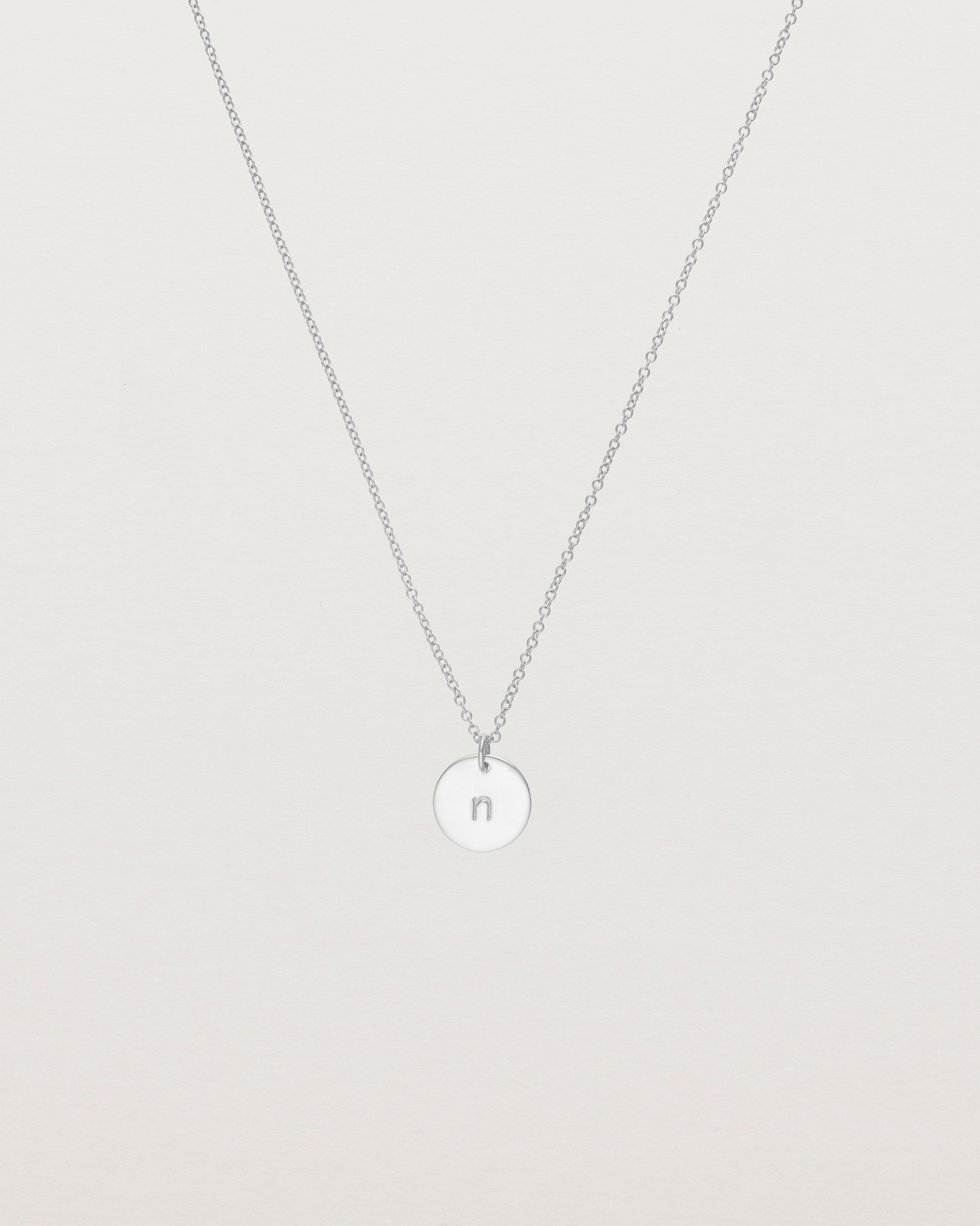 Front view of the Mini Initial Necklace in Sterling Silver.