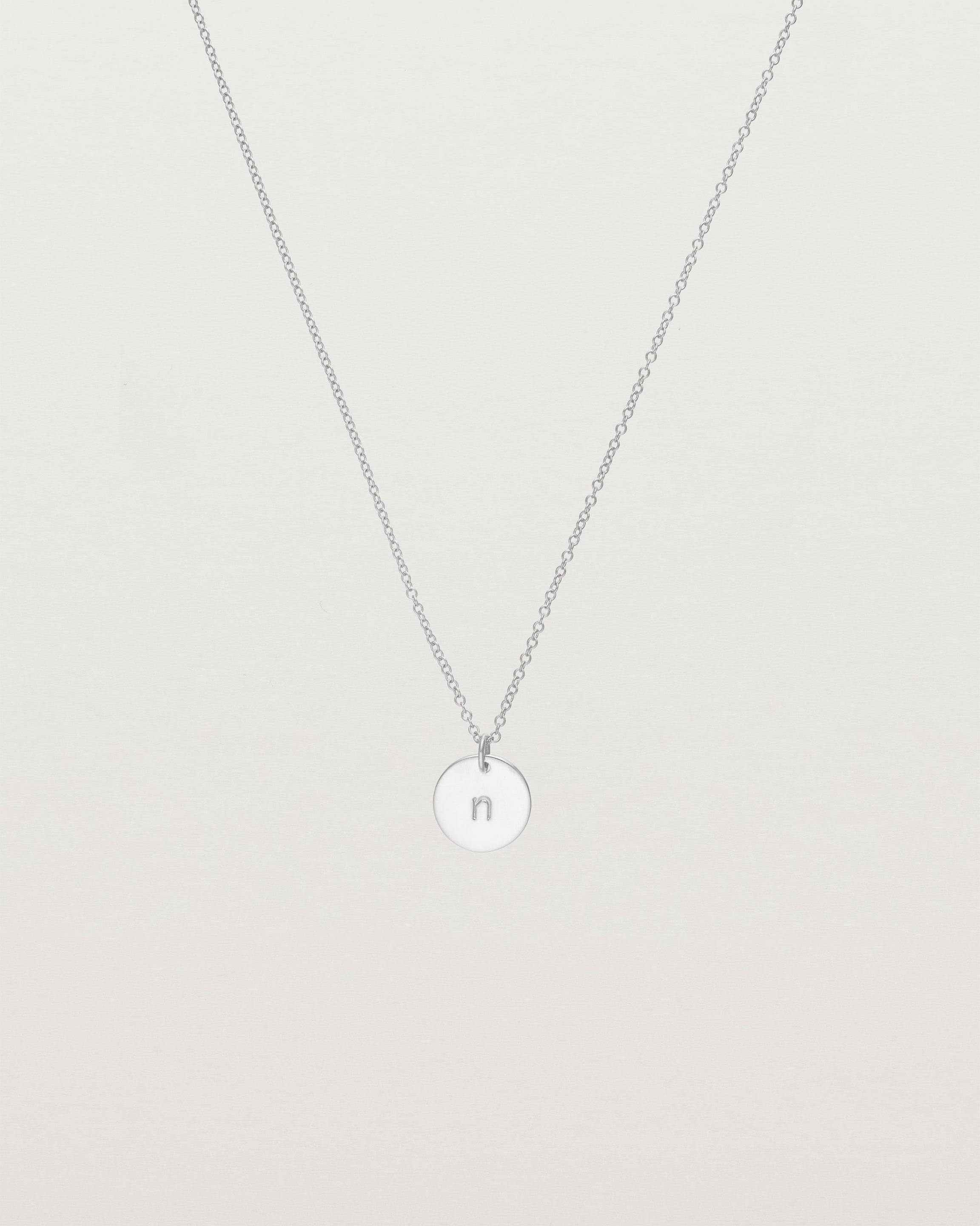 Front view of the Mini Initial Necklace in Sterling Silver.
