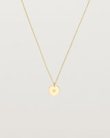 Front view of the Mini Initial Necklace in Yellow Gold.