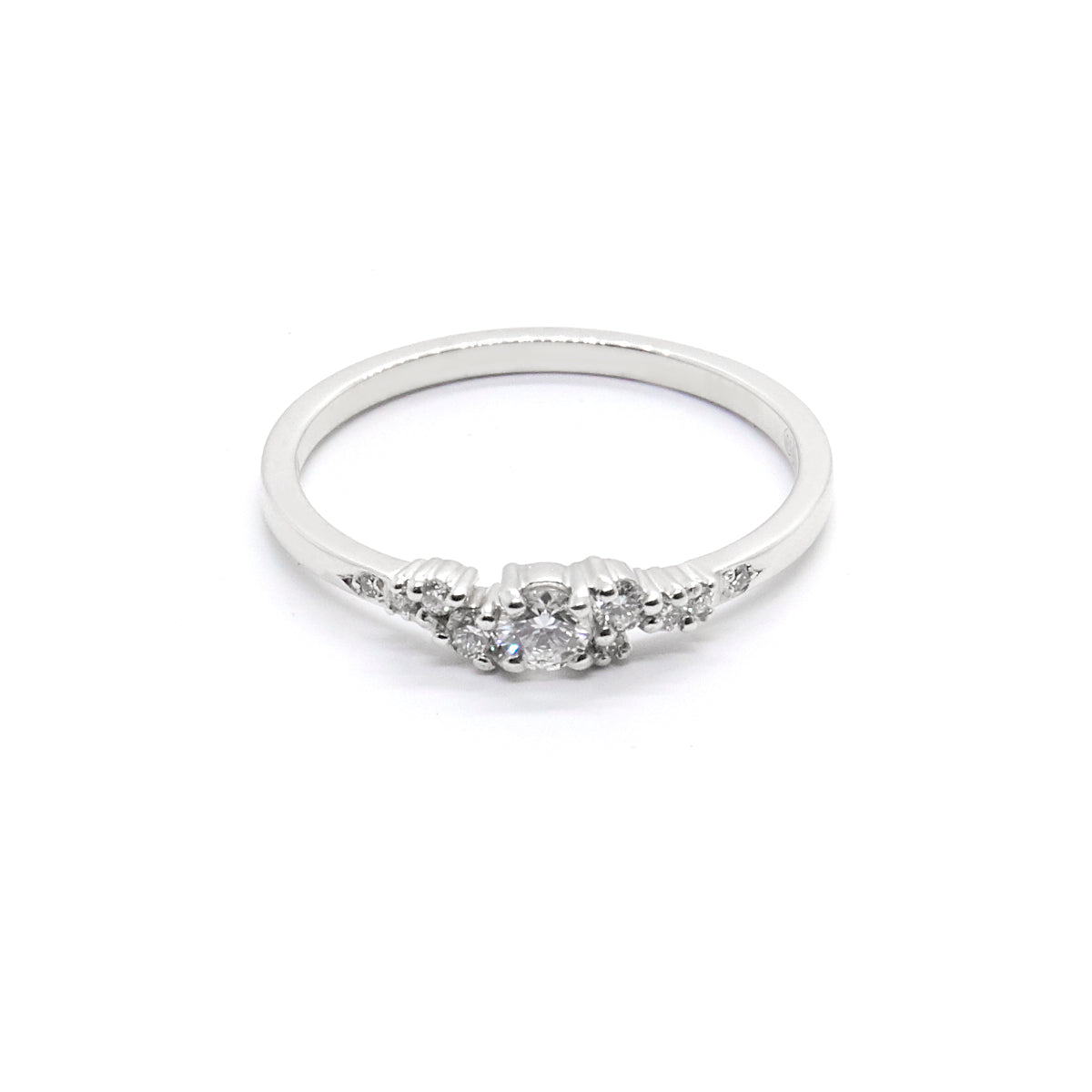 The Petite Diamond Cluster Engagement Ring in White Gold.