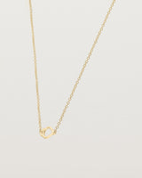 Angled view of  the Oana Necklace in Yellow Gold.