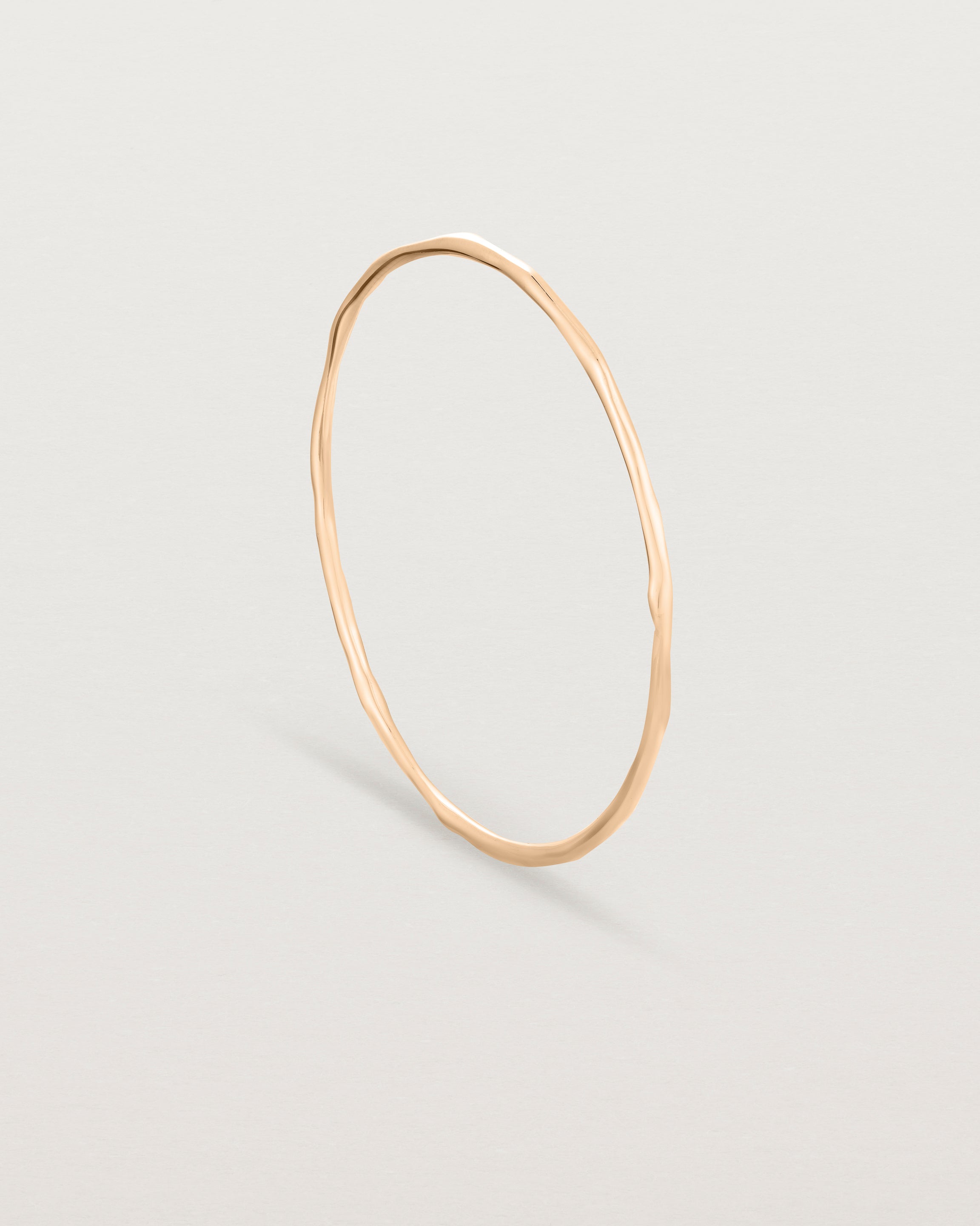 Standing view of the Organic Bangle | Rose Gold.