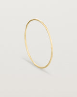 Standing view of the Organic Bangle | Yellow Gold.