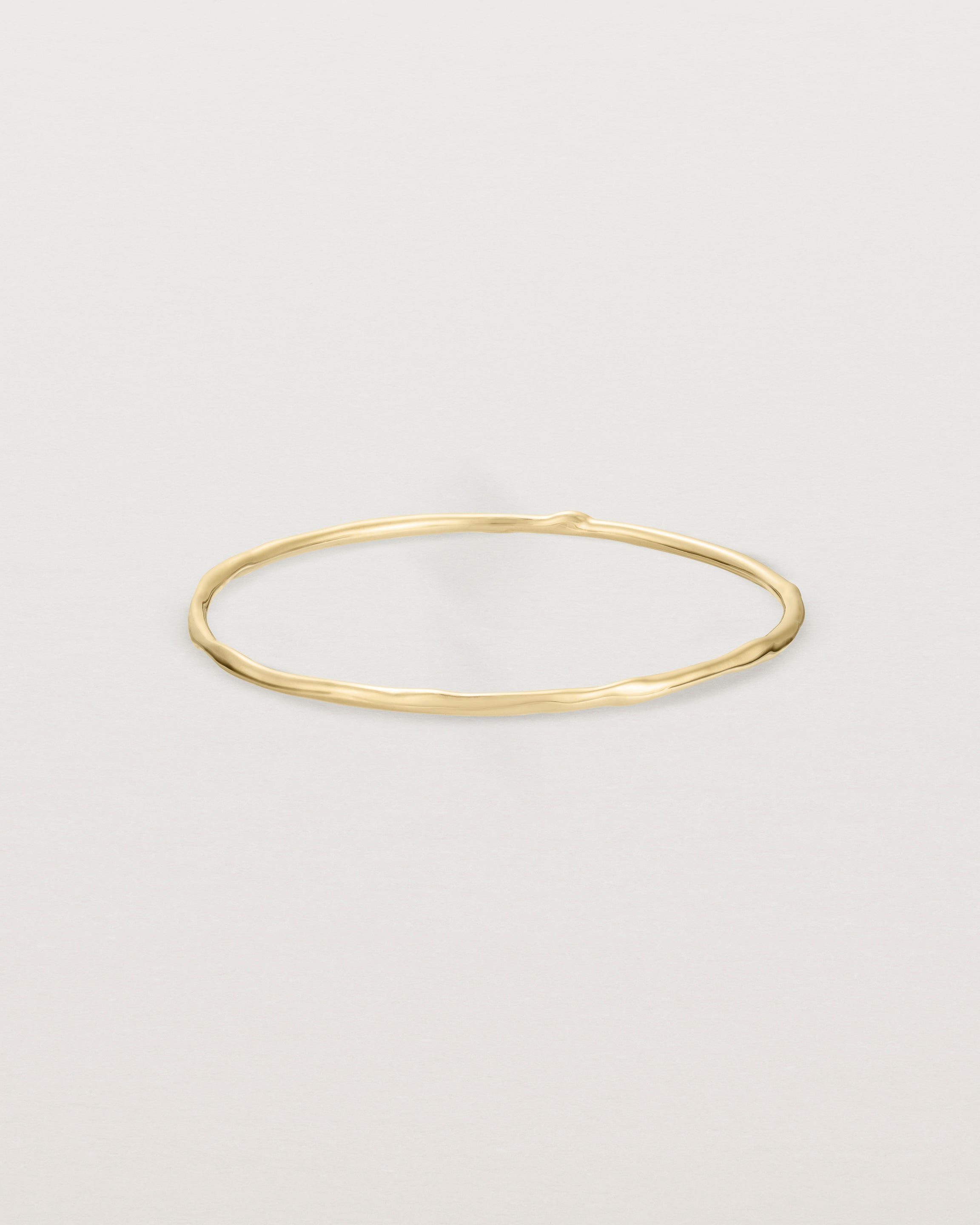 Front view of the Organic Bangle | Yellow Gold.
