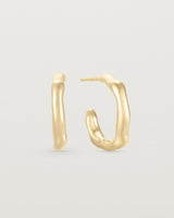 A pair of Organic Hoops | Yellow Gold.