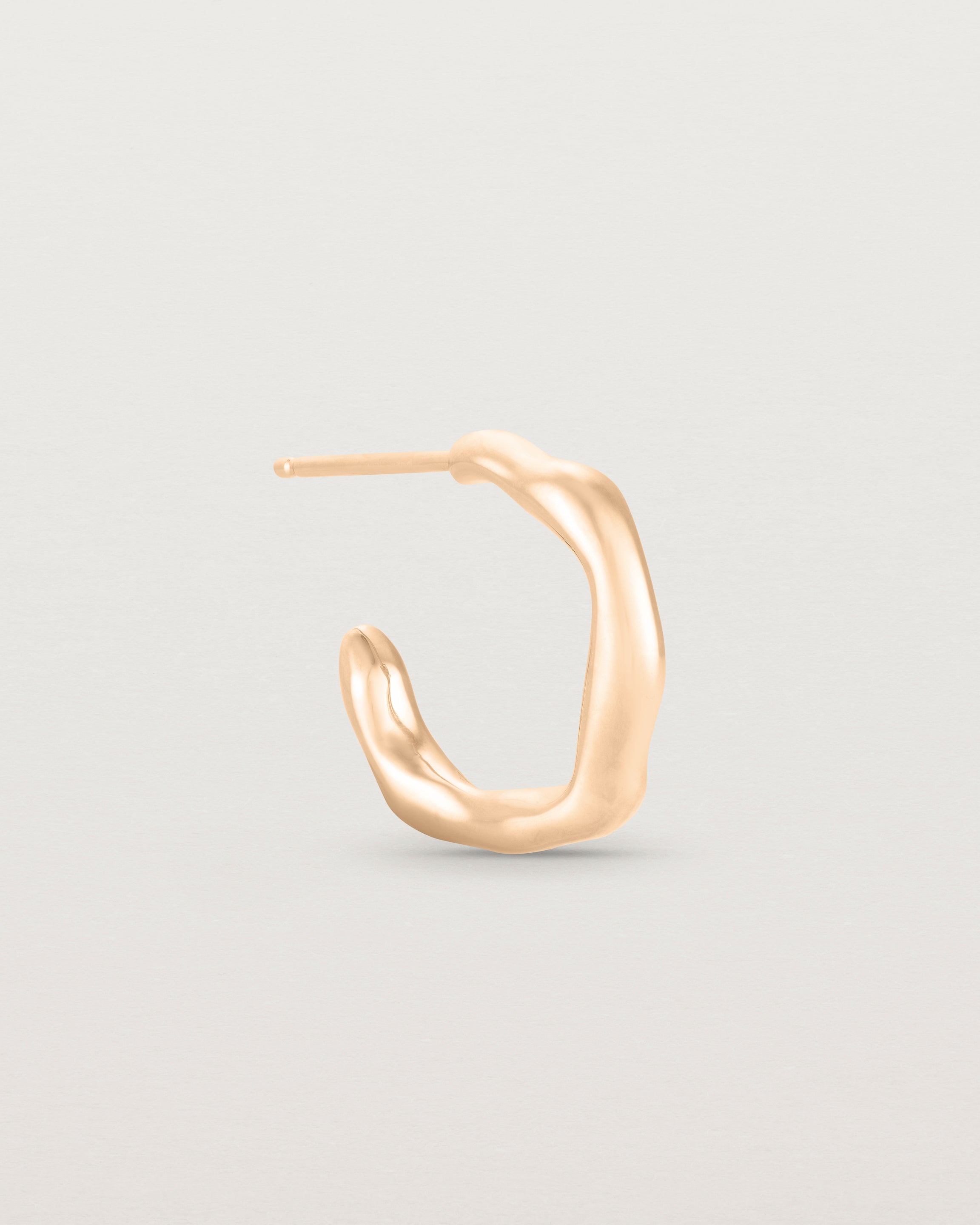 Side view of the Organic Hoops | Rose Gold.
