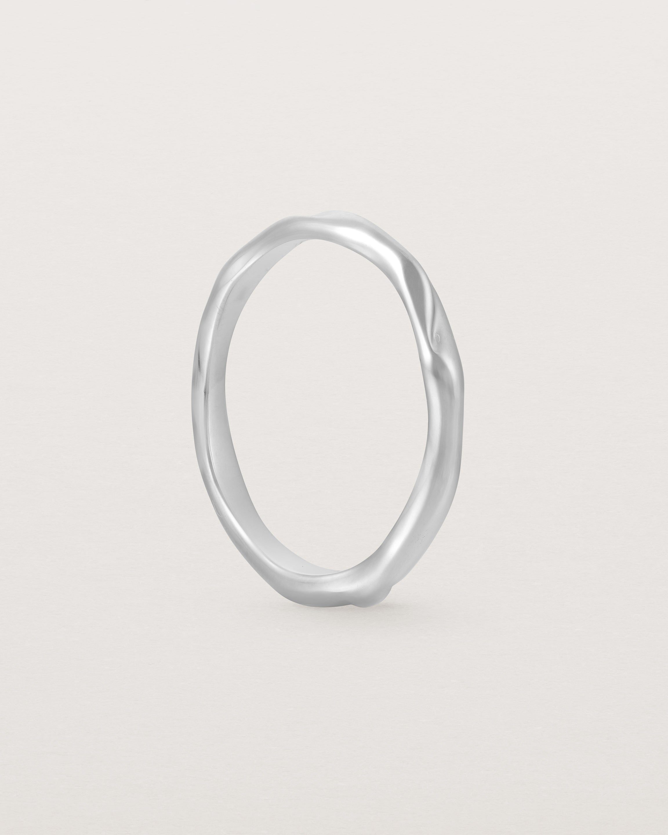 The Organic Wedding Ring | 2mm in White Gold standing. 