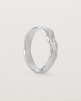 The Organic Wedding Ring | 4mm | White Gold standing. 