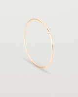 Standing view of the Oval Bangle in Rose Gold.