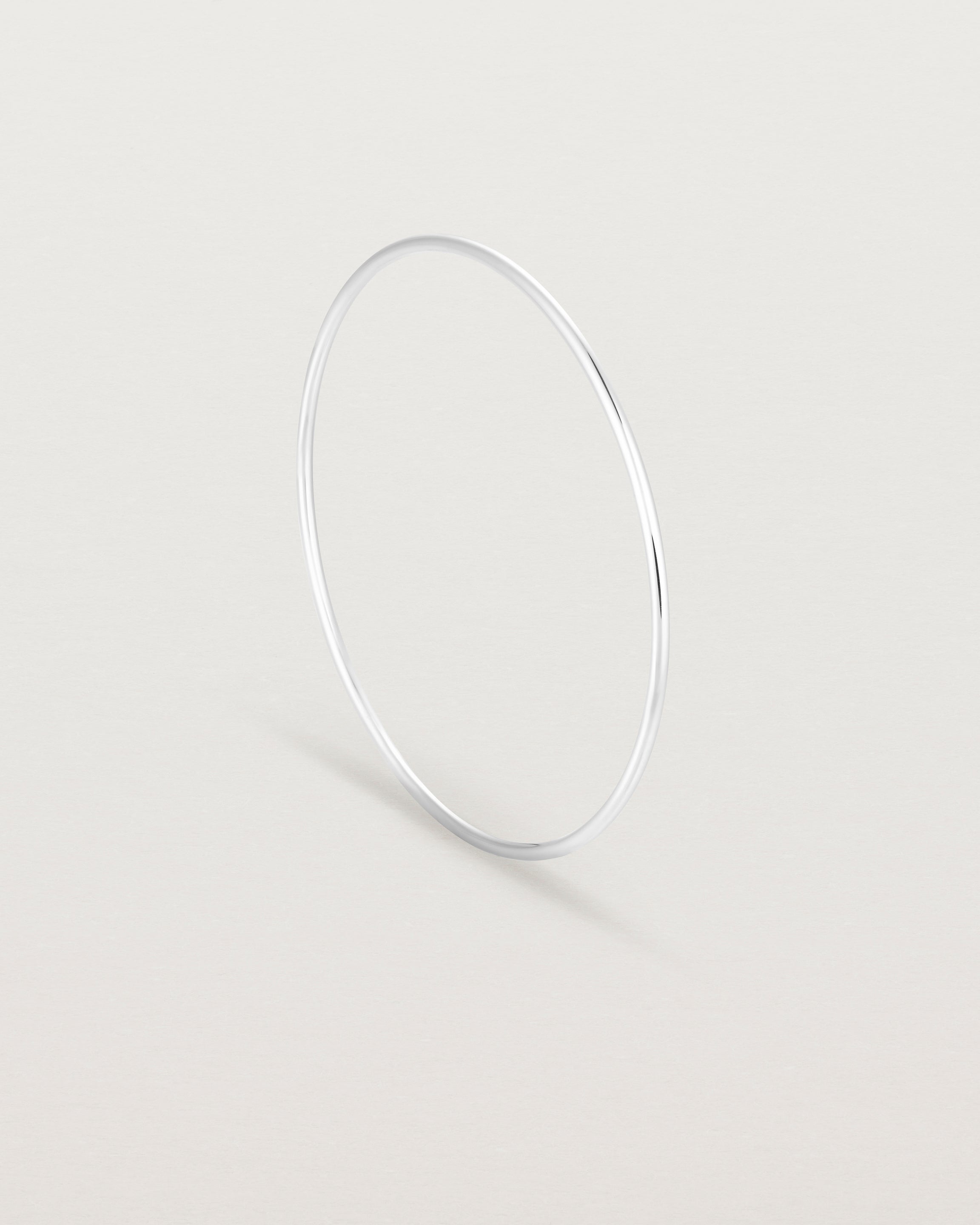 Standing view of the Oval Bangle in White Gold.