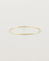 Front view of the Oval Bangle in Yellow Gold.