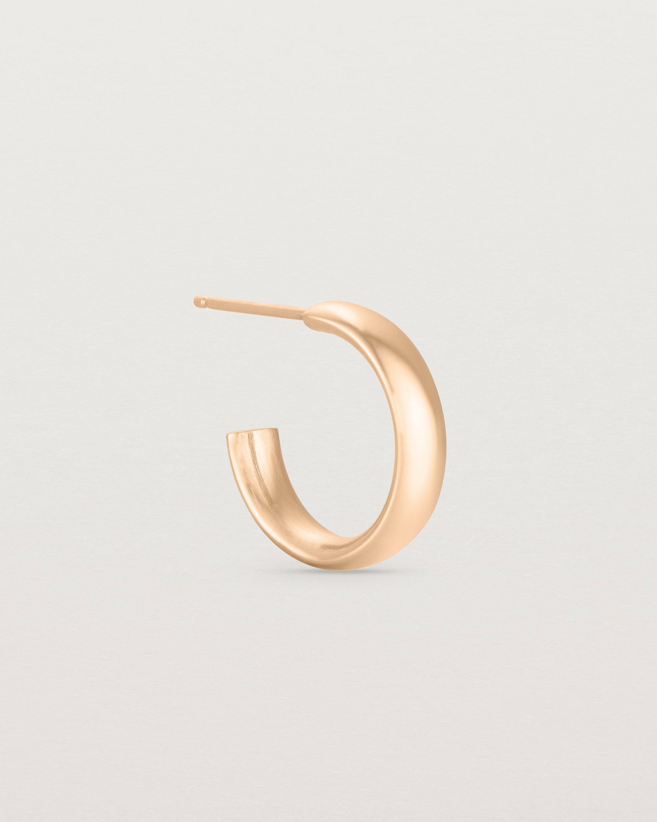 Side view of the Petite Ellipse Hoops | Rose Gold